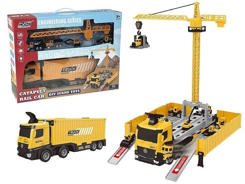 Truck with folding trailer - construction site with crane and cars