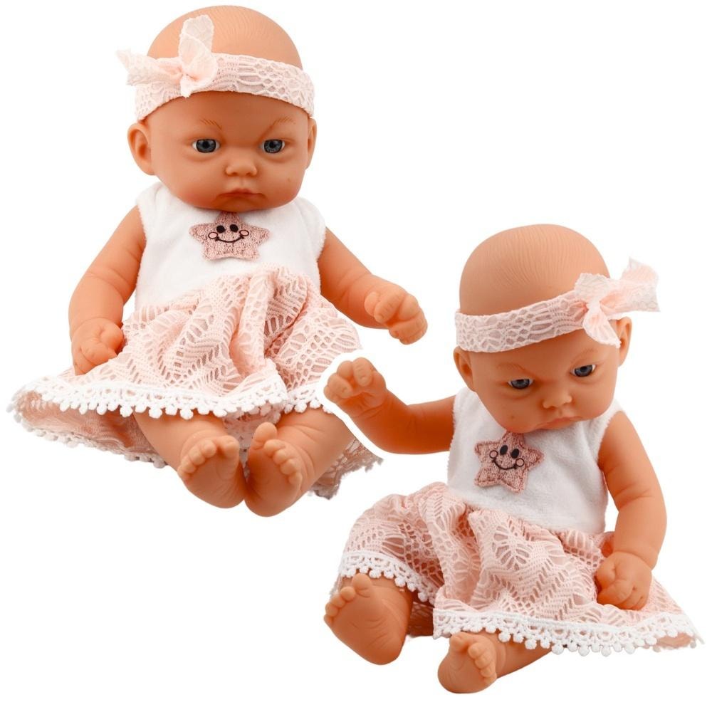 Baby doll in pink dress with lace - perfect for cuddling